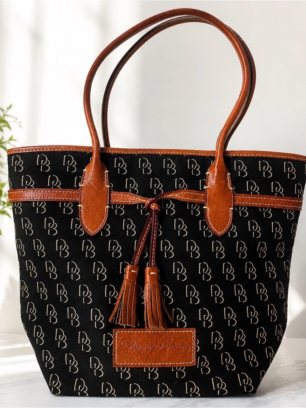 Dooney & Bourke Black Jenna Canvas Tote  DB logo Brown Leather Trim & Tassels